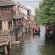 Tourist boats cruise along the canals of the town.